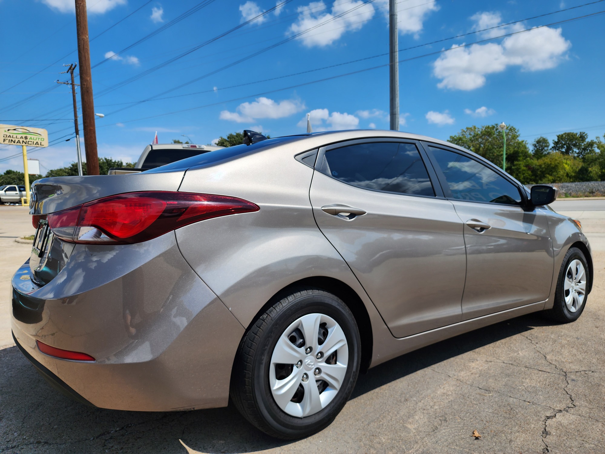 2016 BROWN Hyundai Elantra SE (5NPDH4AEXGH) with an 1.8L L4 DOHC 16V engine, 6-Speed Automatic transmission, located at 2660 S.Garland Avenue, Garland, TX, 75041, (469) 298-3118, 32.885387, -96.656776 - Welcome to DallasAutos4Less, one of the Premier BUY HERE PAY HERE Dealers in the North Dallas Area. We specialize in financing to people with NO CREDIT or BAD CREDIT. We need proof of income, proof of residence, and a ID. Come buy your new car from us today!! This is a Very clean 2016 HYUNDAI ELA - Photo #3